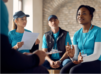 community organization members meeting, highlighting successful web development services for nonprofits and associations